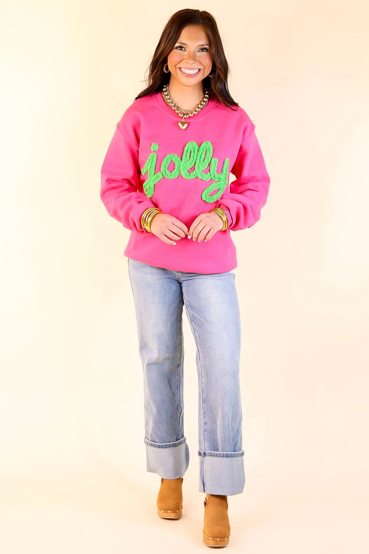 Jolly Hand Stitched in Green Christmas Graphic Sweatshirt in Pink