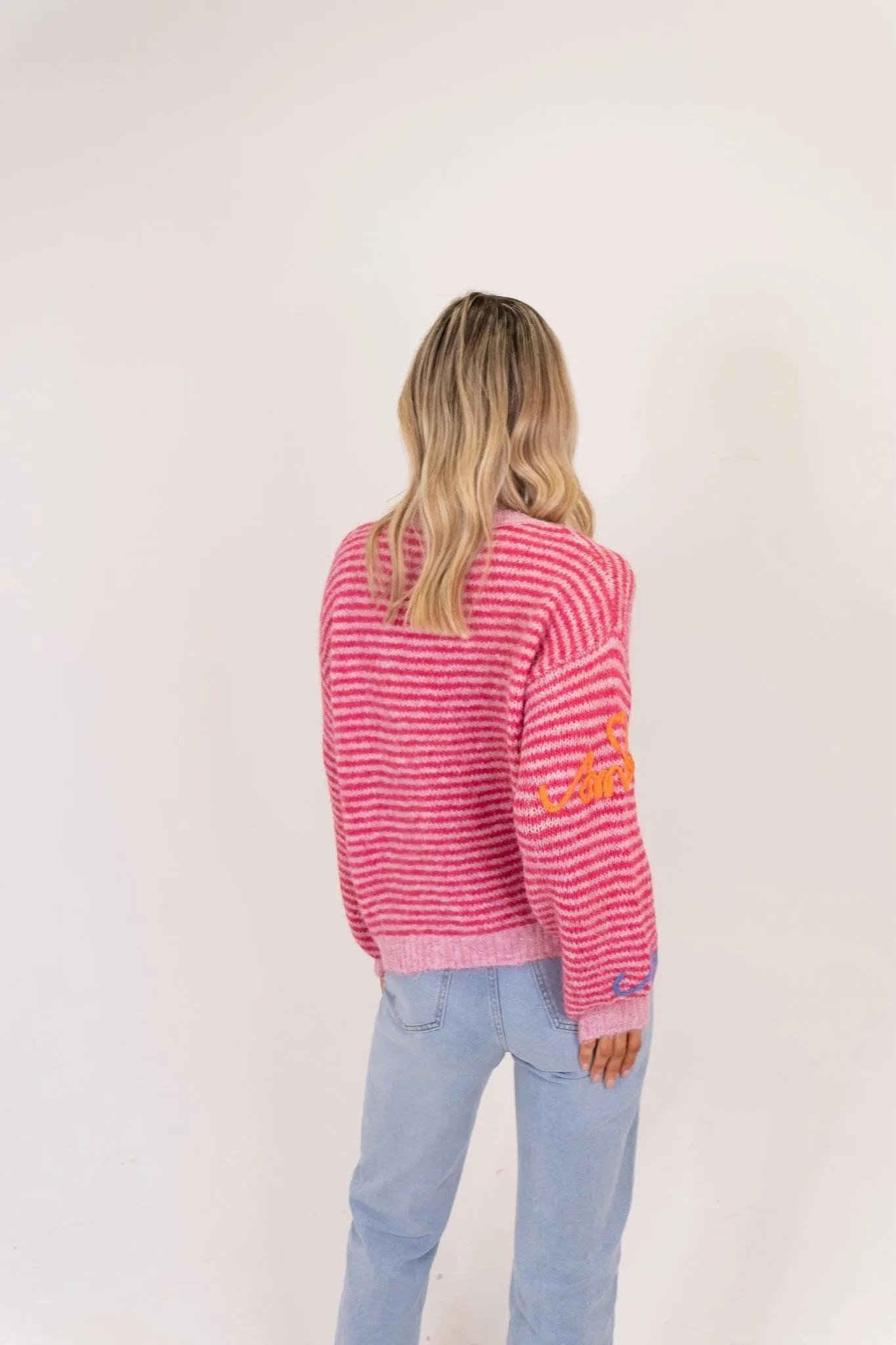 Millie Multi Slogan Jumper In Pink
