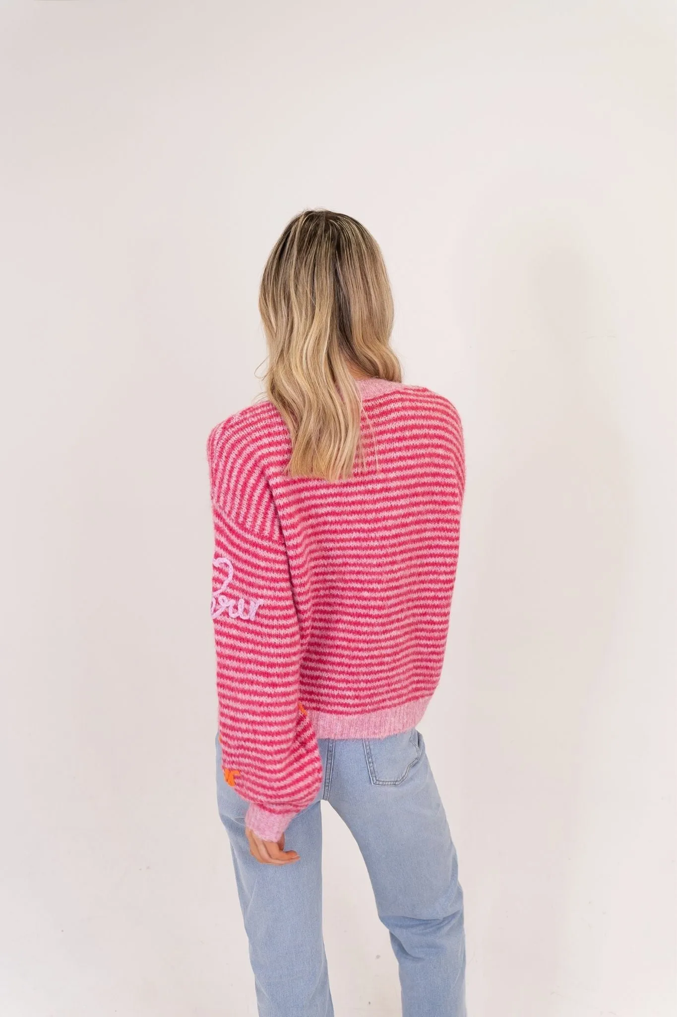 Millie Multi Slogan Jumper In Pink