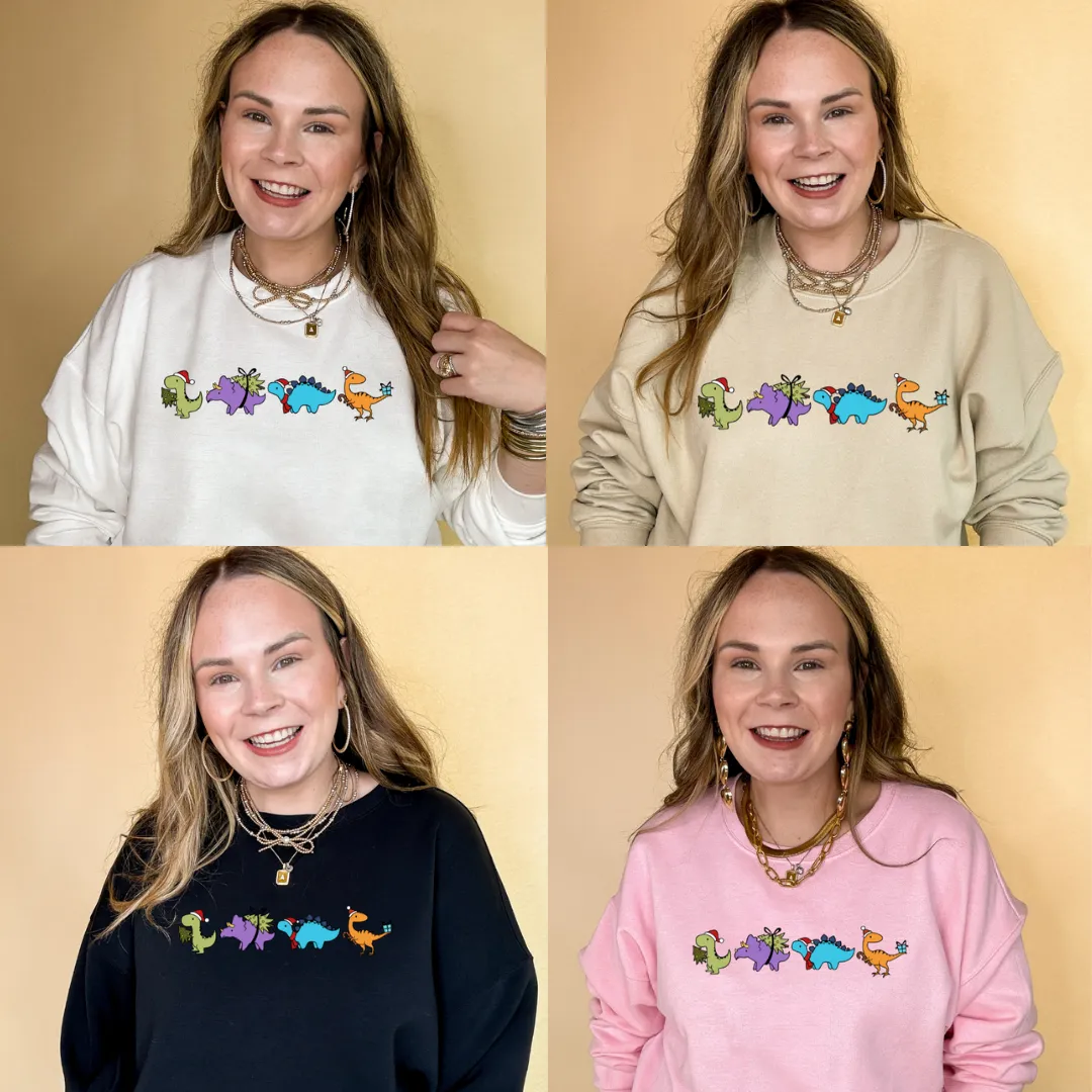 Online Exclusive | Holiday Dinosaur Parade Graphic Sweatshirt in Multiple Color Options