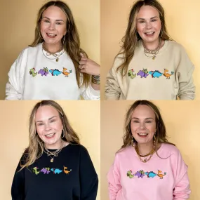 Online Exclusive | Holiday Dinosaur Parade Graphic Sweatshirt in Multiple Color Options