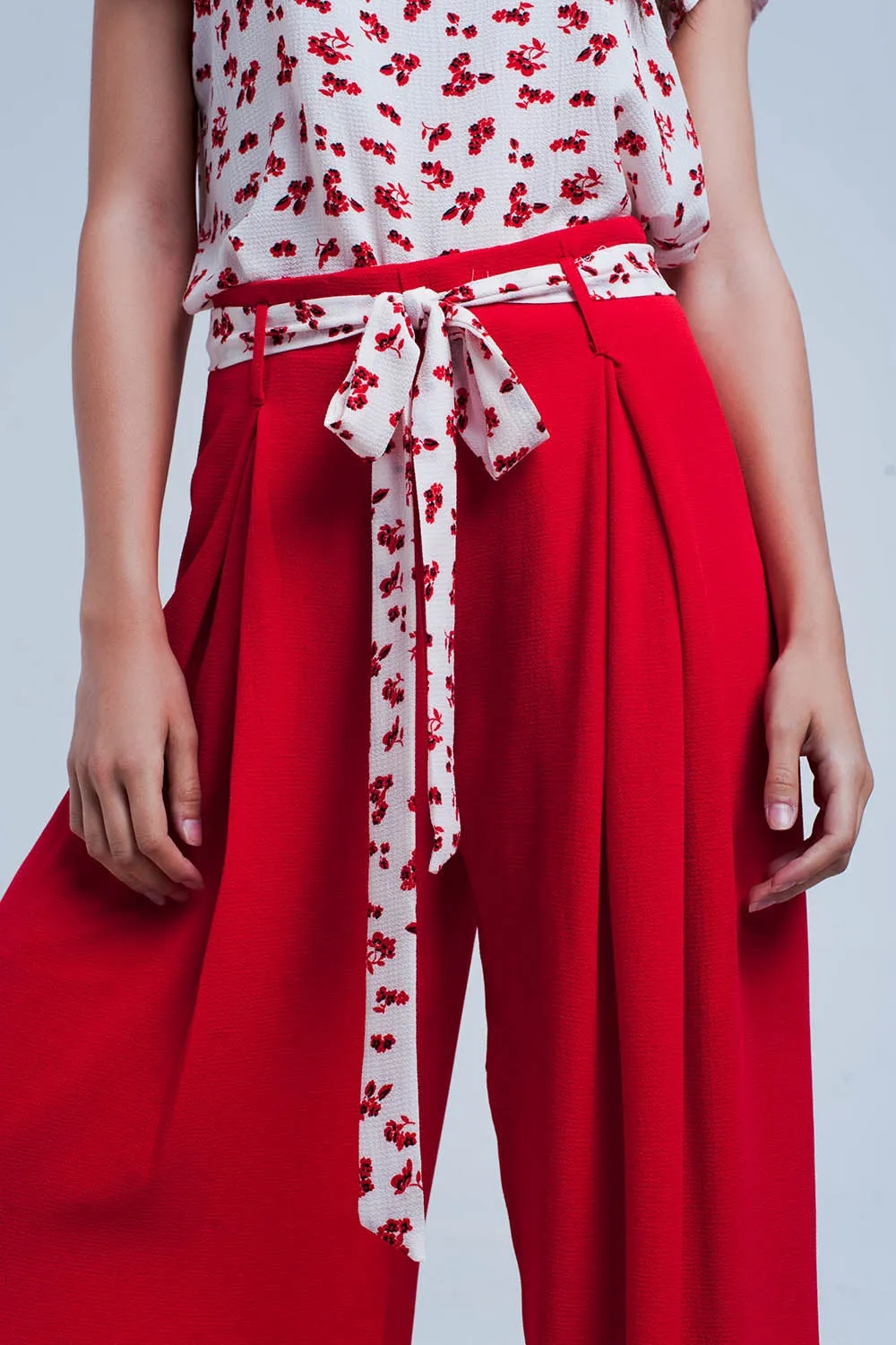 Red Pants With Floral Belt